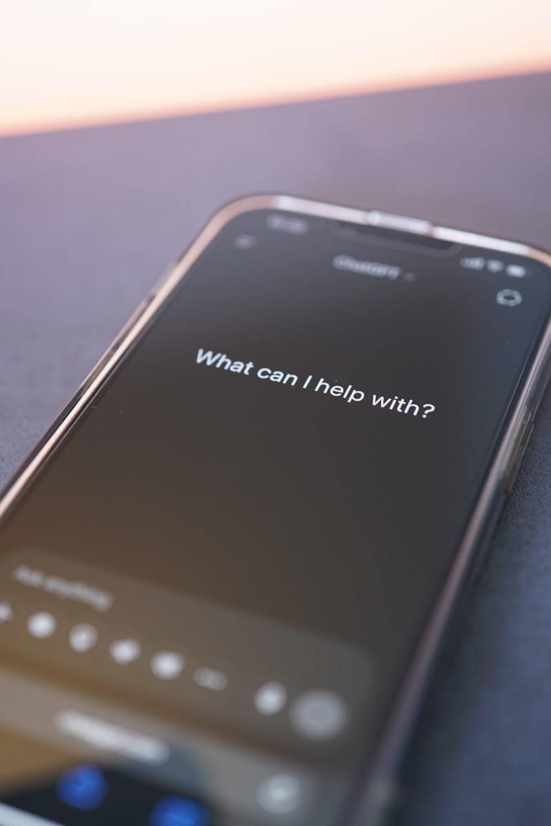 Phone screen asks: "what can i help with?" Waiting for somebody to try a free ai tarot reading.