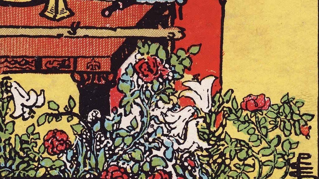 Close-up of the roses and lilies growing under the Magician's table in the Rider-Waite-Smith tarot