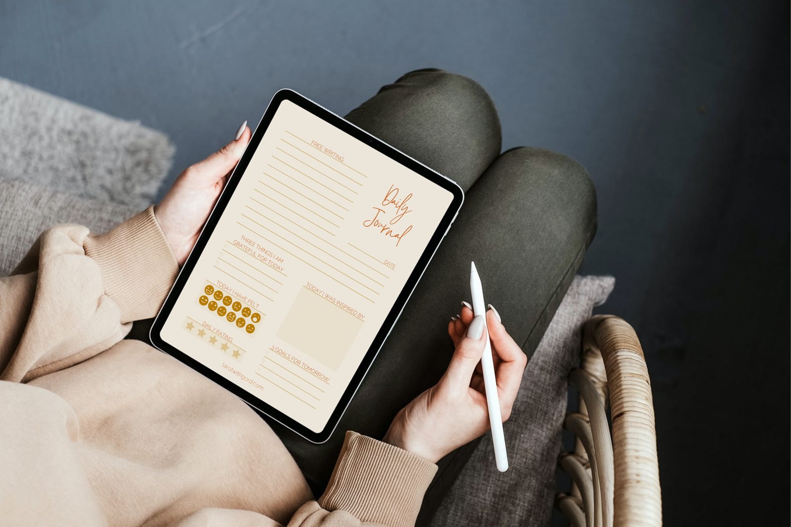 Somebody filling out the Daily digital journal using an iPad with an Apple Pencil.