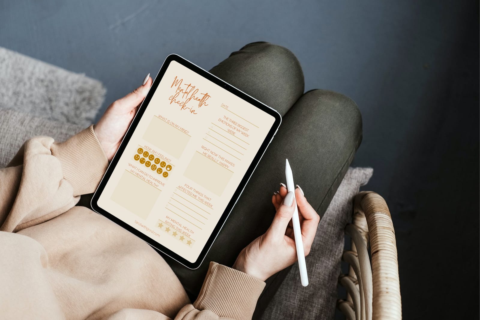 Somebody filling out the Mental Health Check-In digital journal using an iPad with an Apple Pencil.