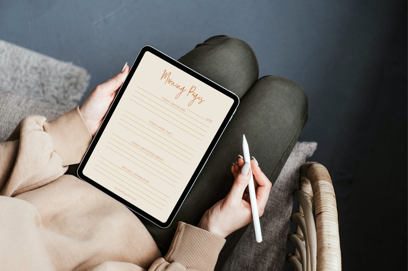 Somebody filling out the Morning Pages digital journal using an iPad with an Apple Pencil.