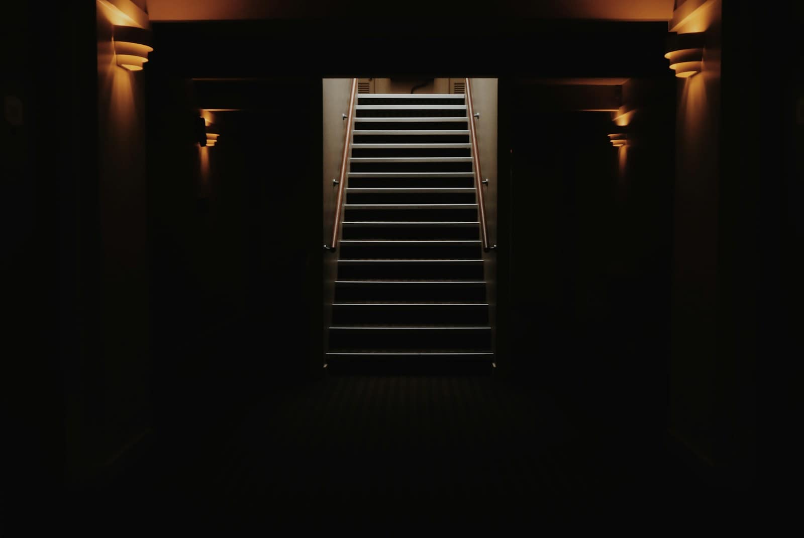 black staircase in dark room