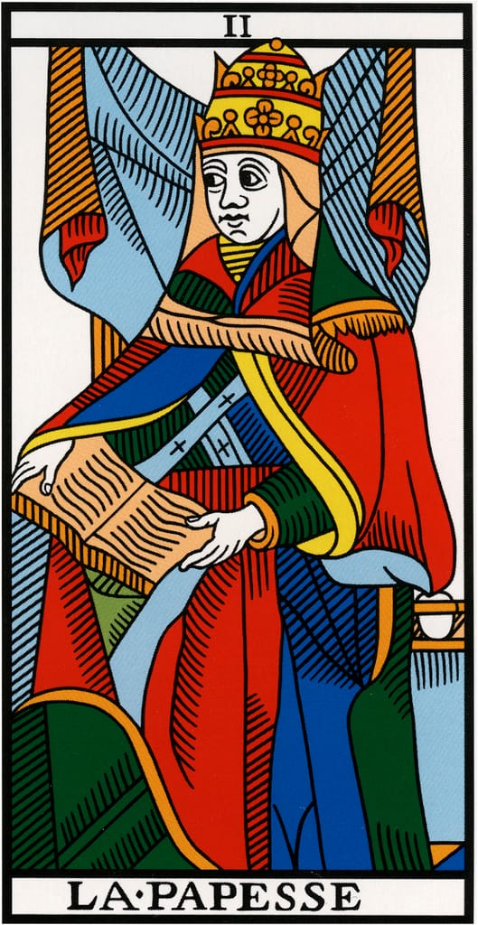 The Popess card (La Papesse) from the Tarot de Marseille, showing a crowned, robed female figure seated between two drapes, holding a book across her lap, with a solemn expression and traditional woodcut-style colouring.