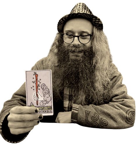 Gord holding the Ace of Wands card