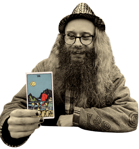 Gord holding the Eight of Cups card