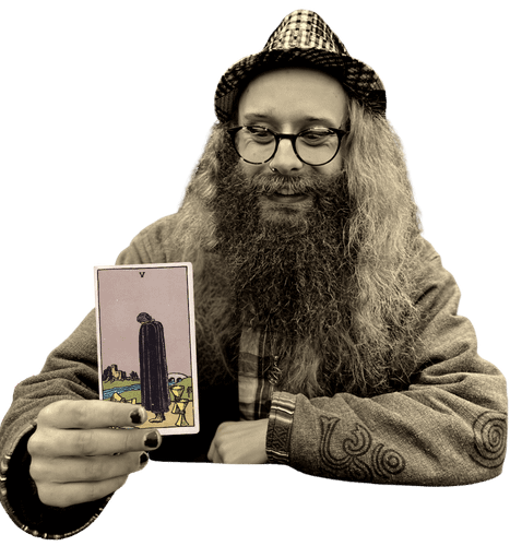 Gord holding the Five of Cups card