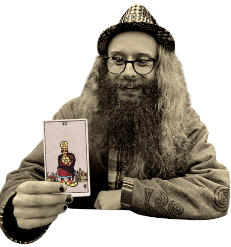 Gord holding the Four of Pentacles card