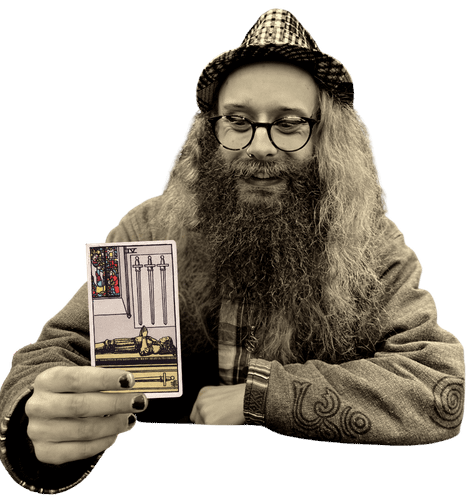 Gord holding the Four of Swords card