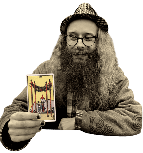 Gord holding the Four of Wands card