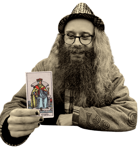Gord holding the King of Cups card