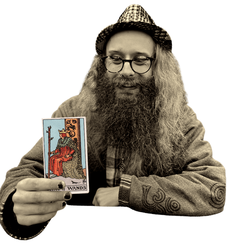 Gord holding the King of Wands card