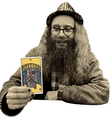 Gord holding the Nine of Cups card