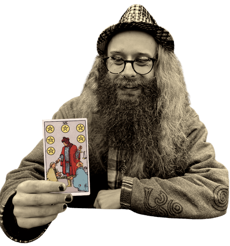 Gord holding the Six of Pentacles card