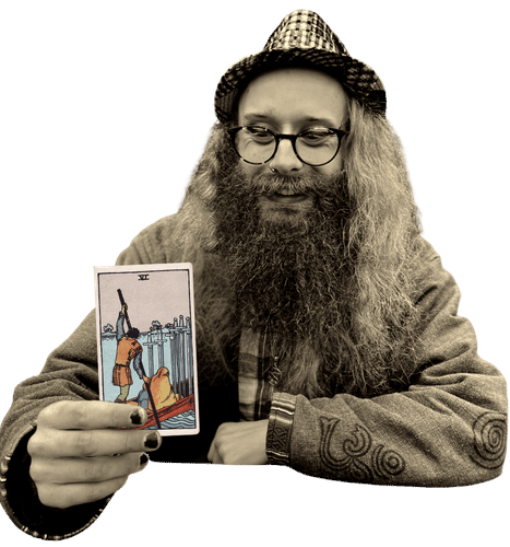 Gord holding the Six of Swords card