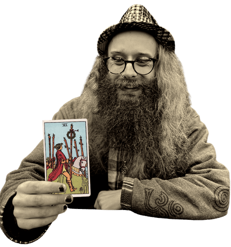 Gord holding the Six of Wands card