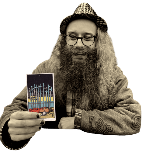 Gord holding the Ten of Swords card