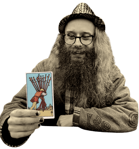 Gord holding the Ten of Wands card