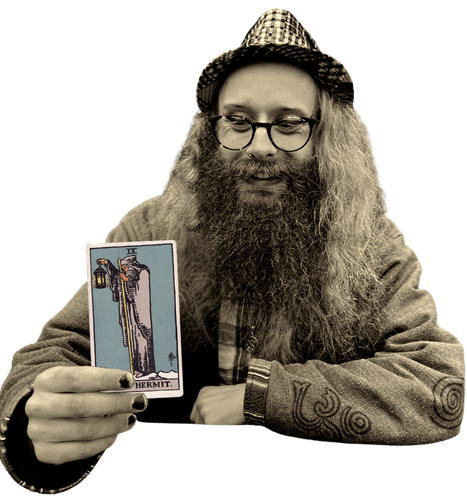 Gord holding the Hermit card