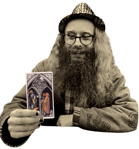 Gord holding the Three of Pentacles card