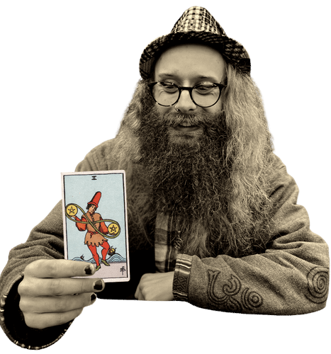 Gord holding the Two of Pentacles card
