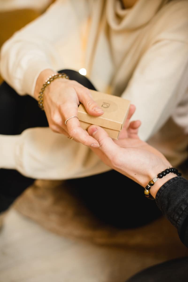 person holding a gift