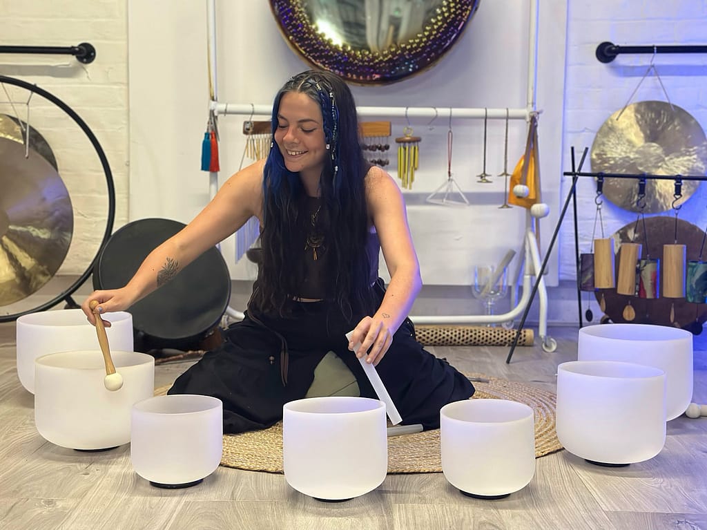 What Are the Benefits of a Sound Bath? 5 Reasons They Work 4 One of our therapists offering a sound bath in Eccles